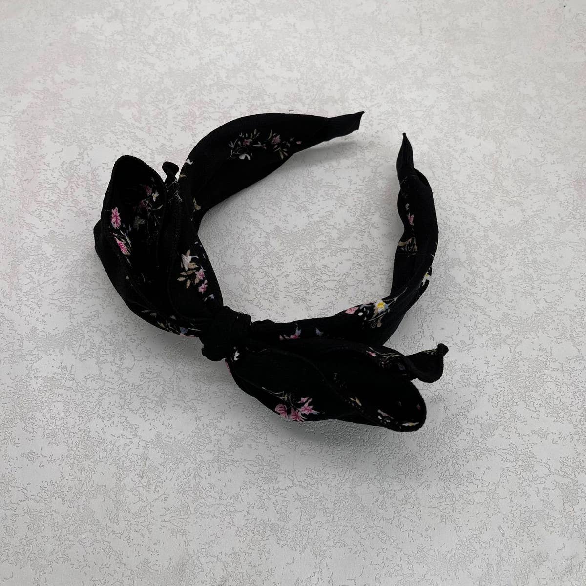 WIDE-BRIMMED FLORAL BOW HEADBAND