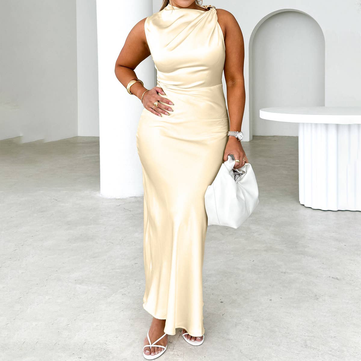 Satin dress with diagonal shoulders and fishtail