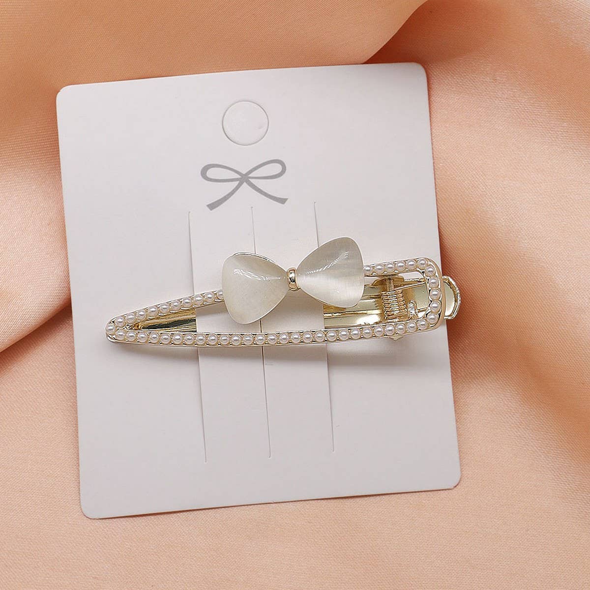 CAT'S EYE STONE BOW HAIRPIN SIDE BANGS CLIP_CWAHA4710