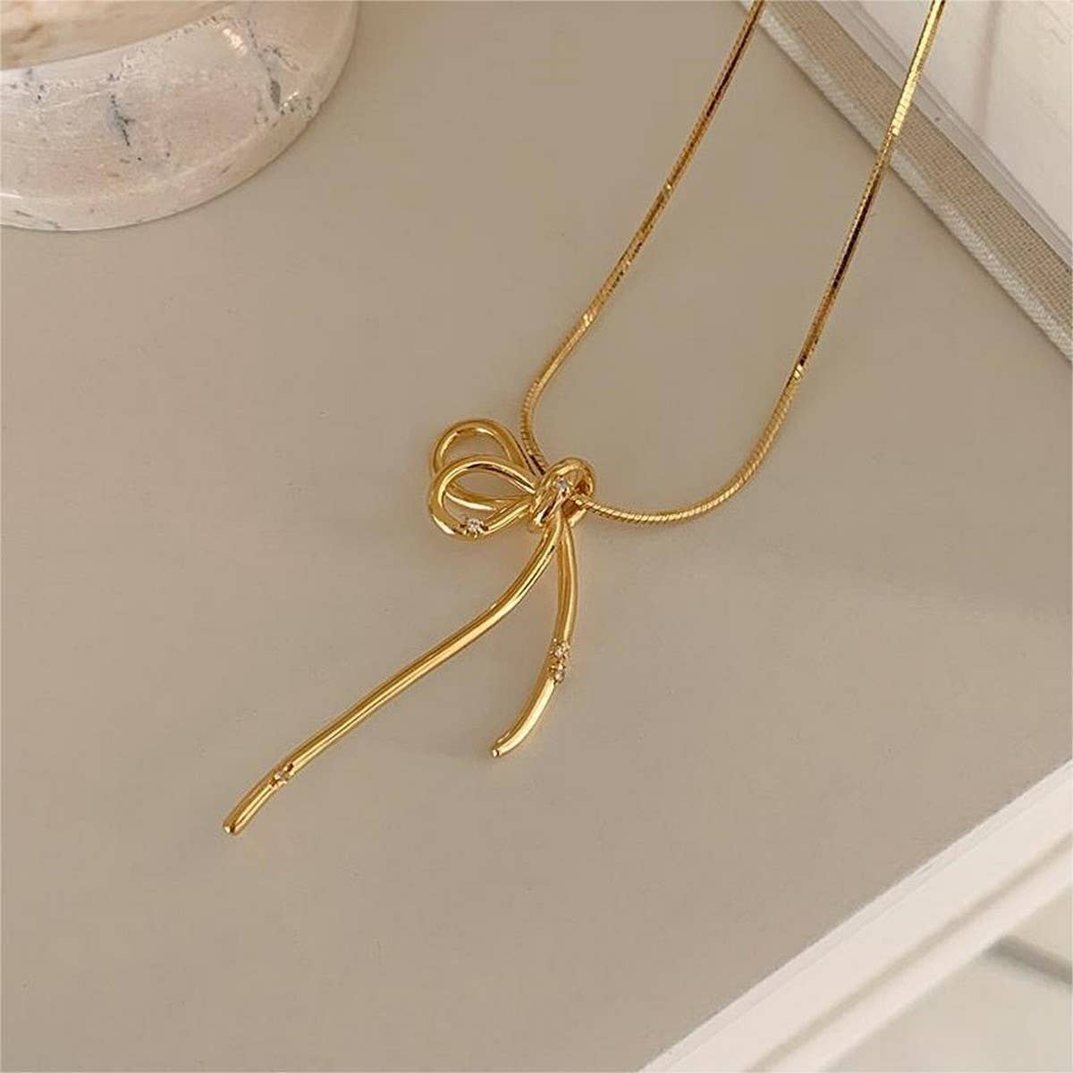 BASIC BOW FRESH AND SWEET NECKLACE_CWAJE1597