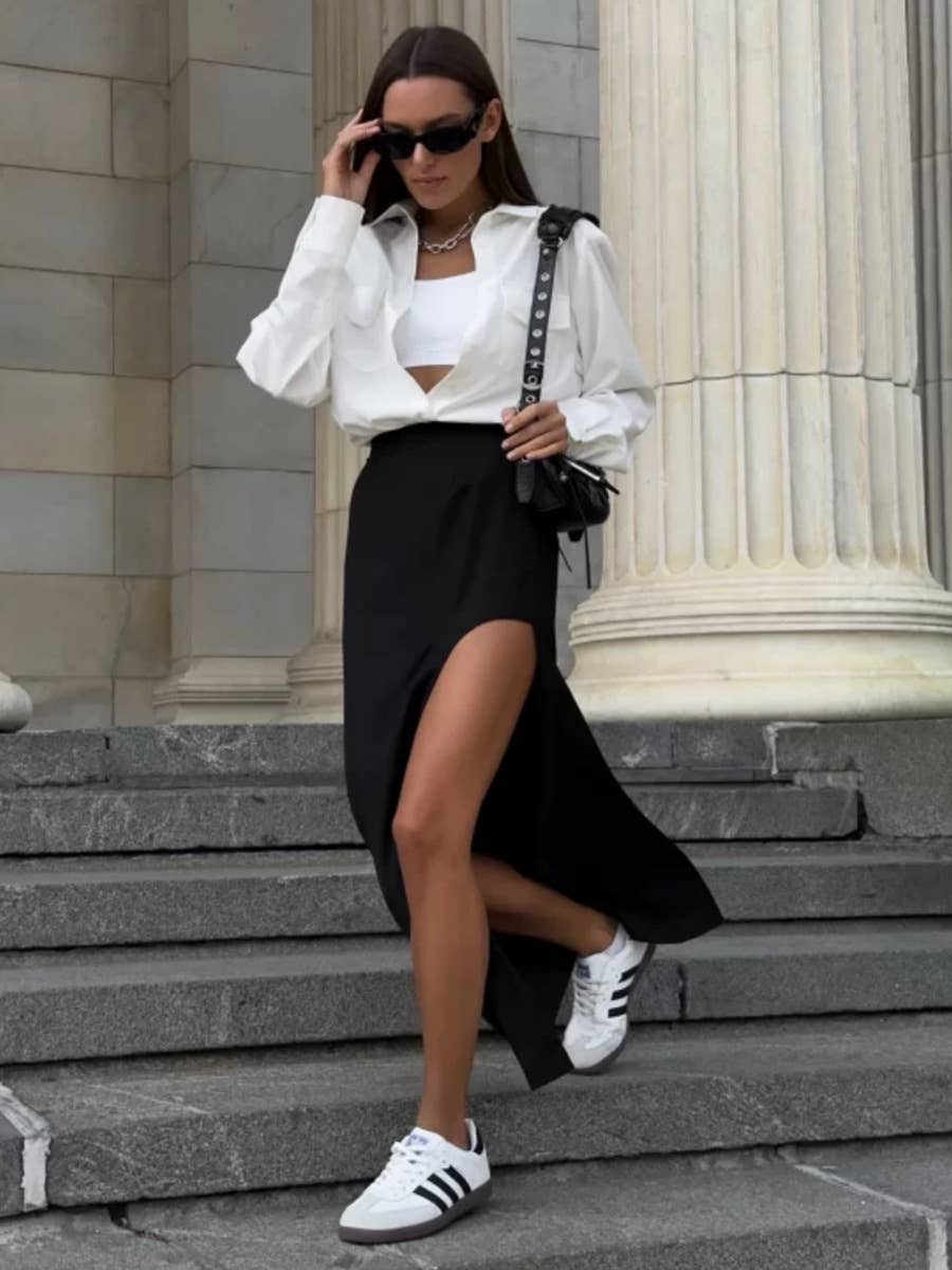 Irregular high-slit solid color long skirt