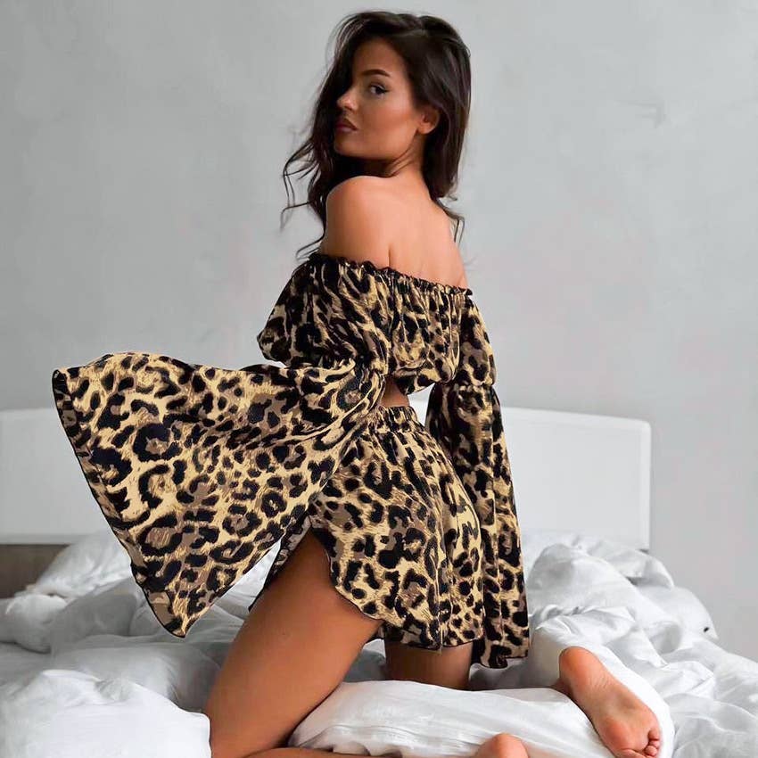 A one-shoulder top shorts and leopard print suit