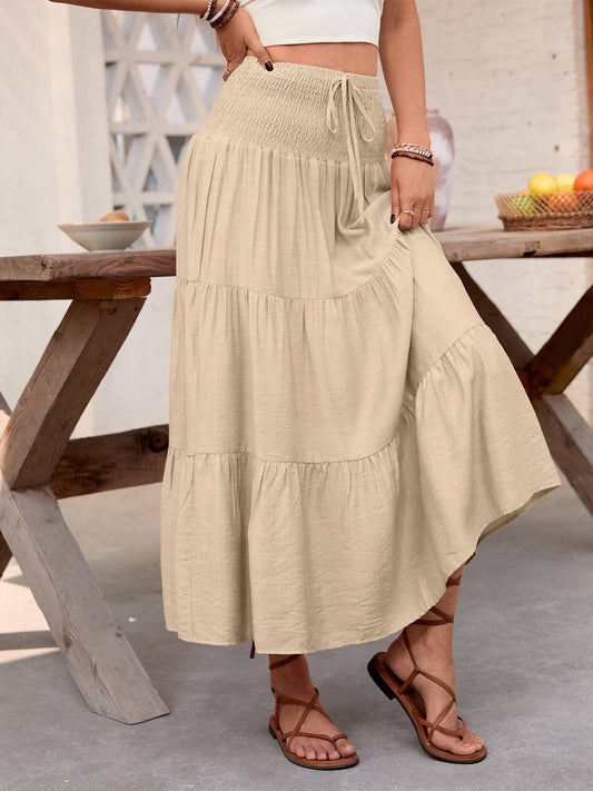 A casual solid-color layered tie A-line skirt