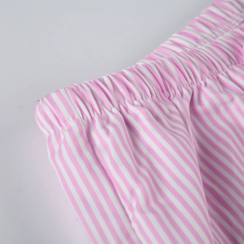 Low-waisted loose-fitting straight-leg trousers