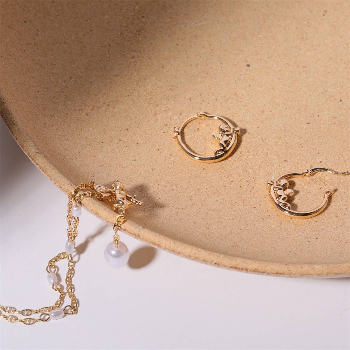 Sweet Cupid Pearl Bow Compass Dangle Earrings