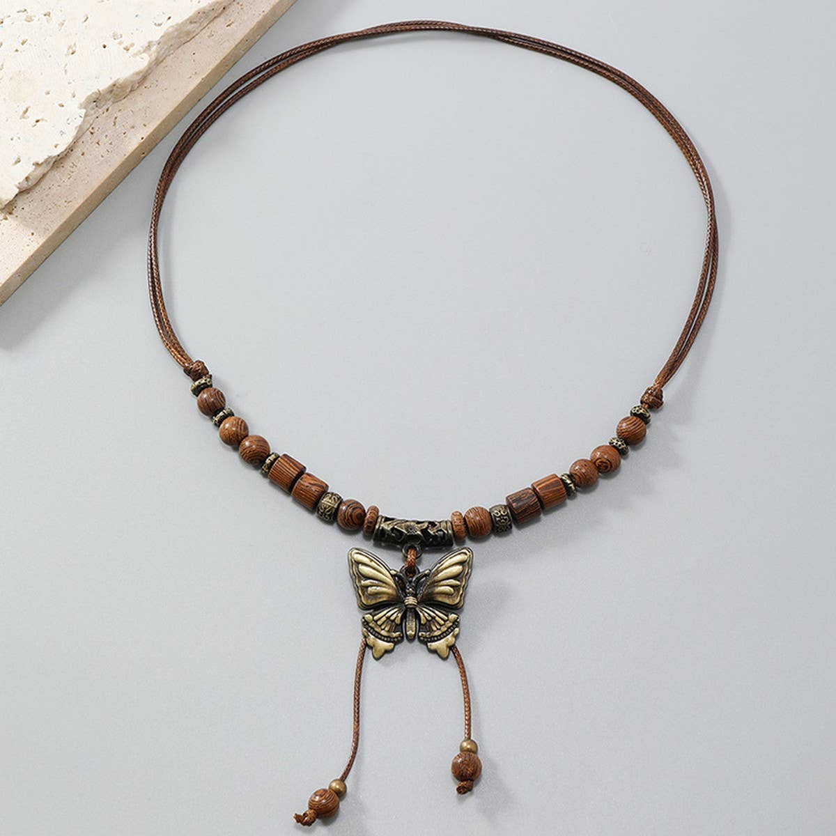 LONG WOODEN BEAD BUTTERFLY TASSEL NECKLACE