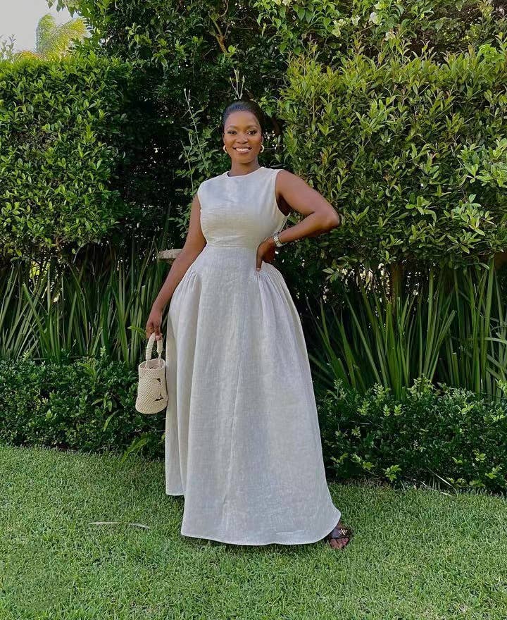 Sleeveless solid-color vest dress with large hem