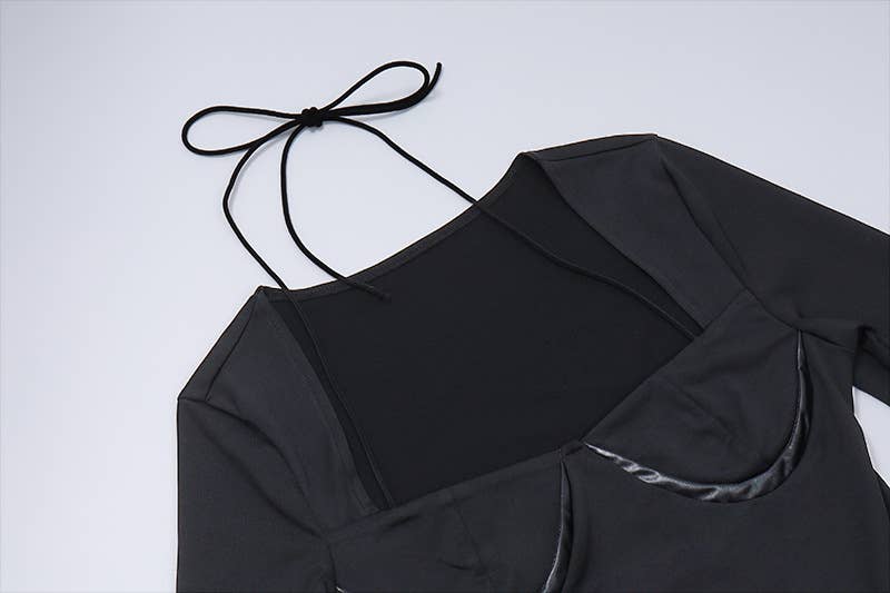 Long-sleeved solid-color jumpsuit with a neckline