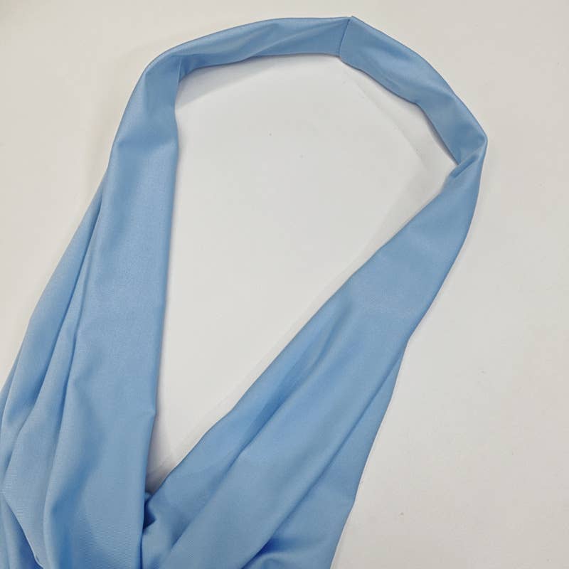 A cinched-neck backless and collared dress