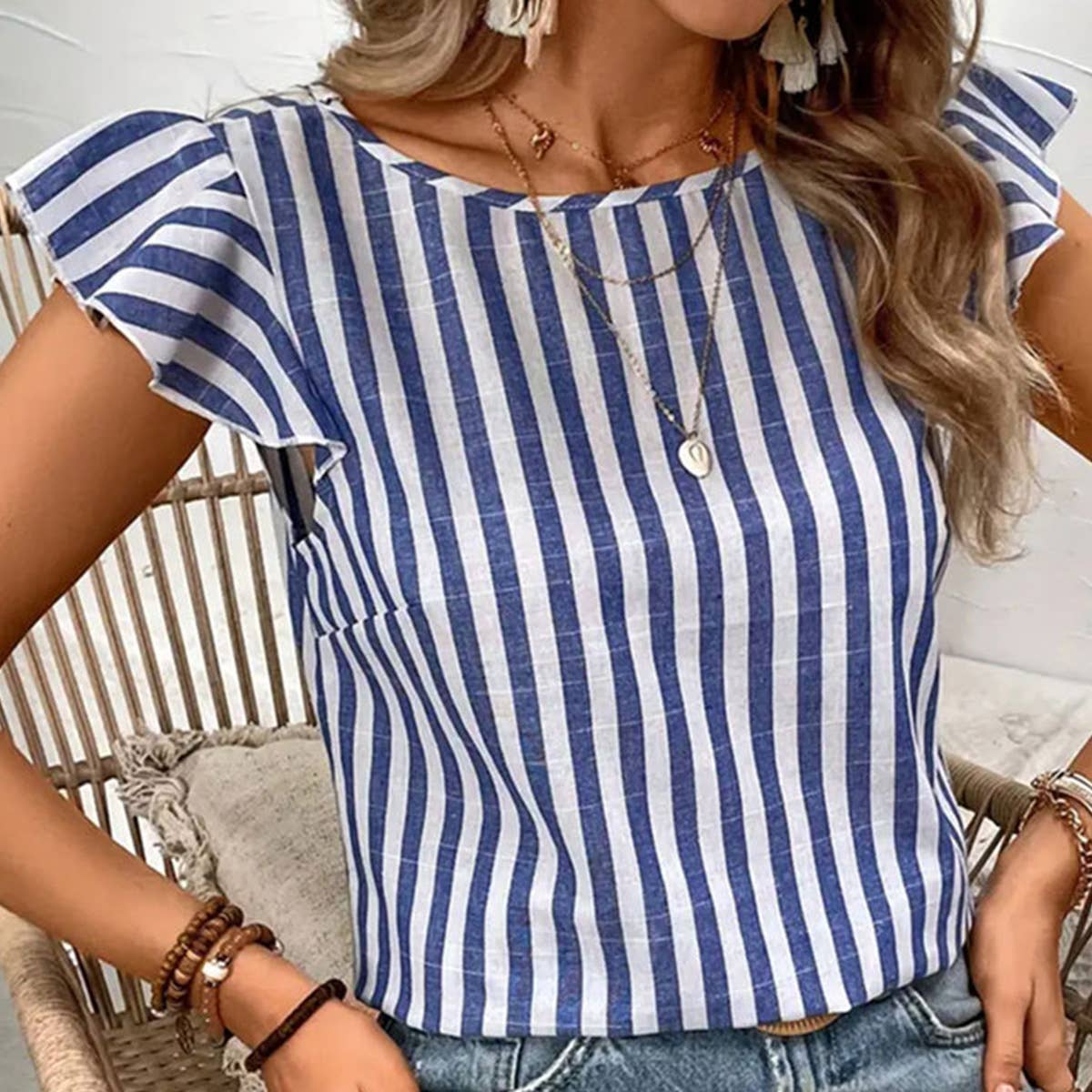 V-neck with back buttons flying sleeveless top