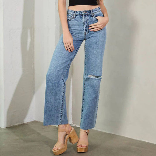 High-waisted washed fashionable ripped jeans