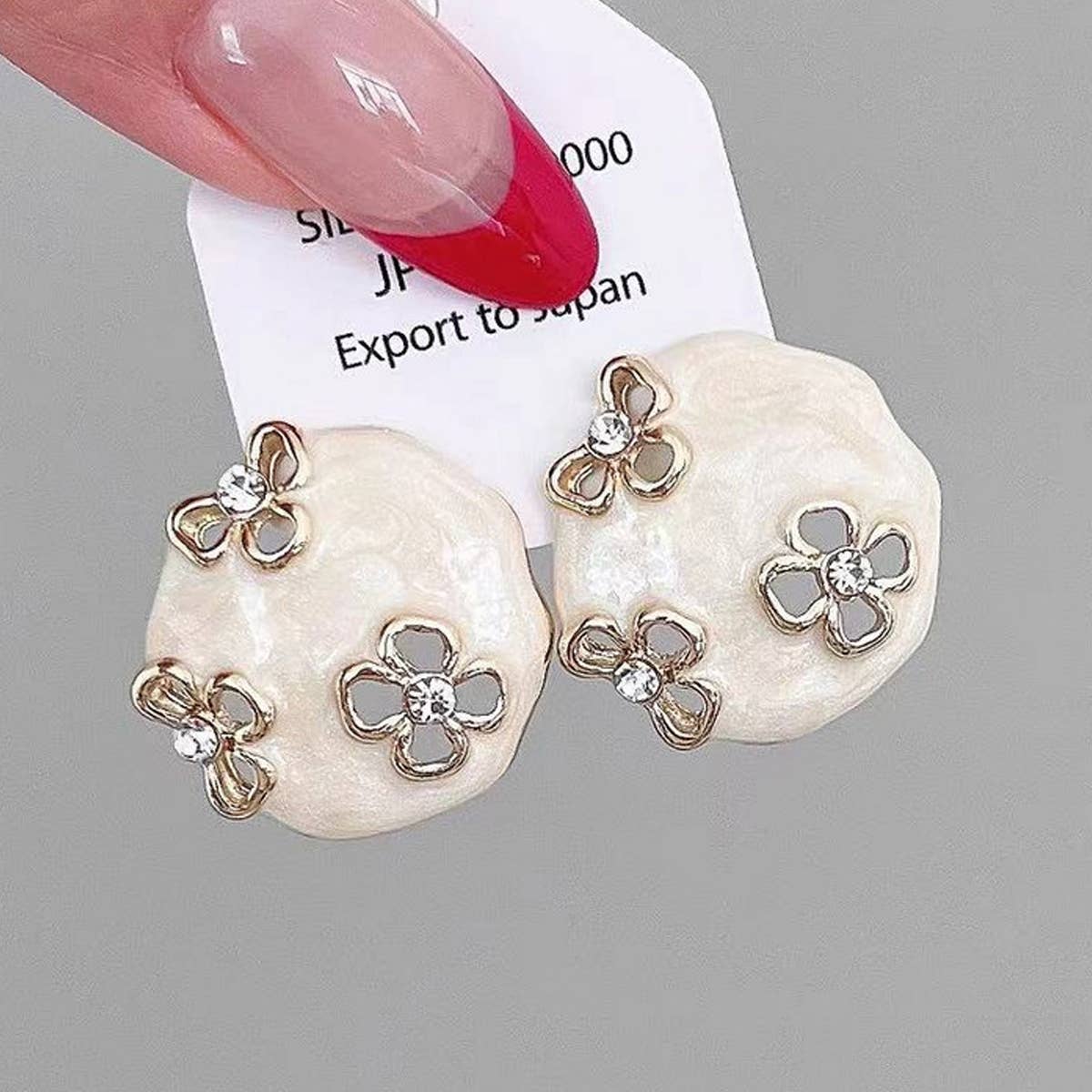HOLLOW ZIRCON GEOMETRIC FLOWER EARRINGS