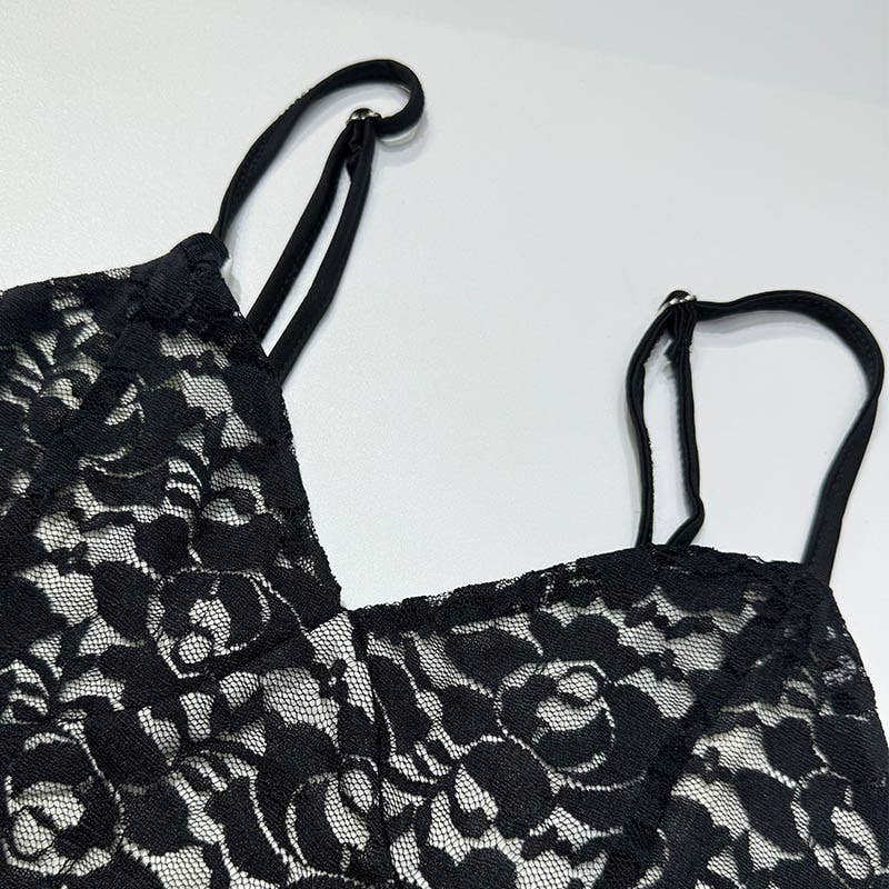 A strappy deep V lace see-through dress