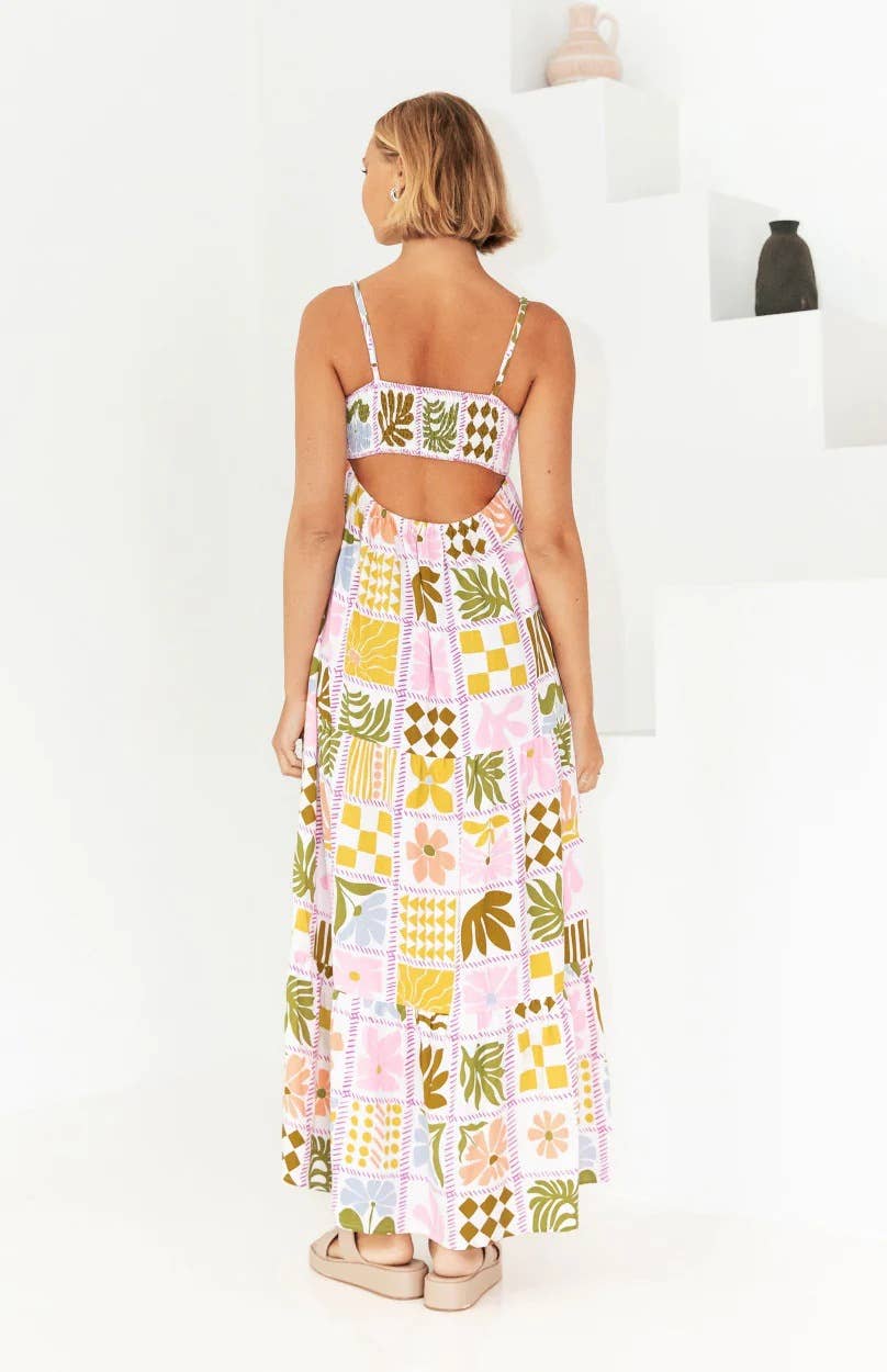 Printed and distinctive back-cut halter dress