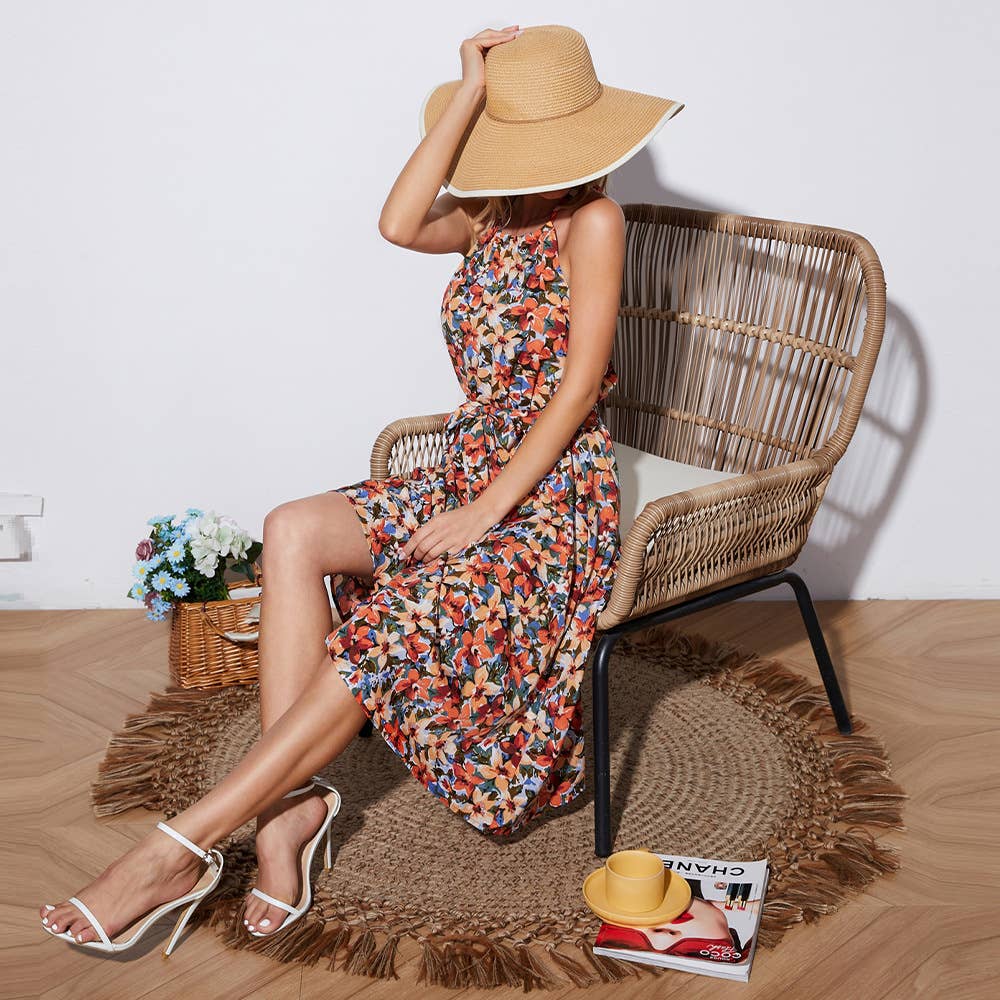 Mid-length printed dress with halter strap