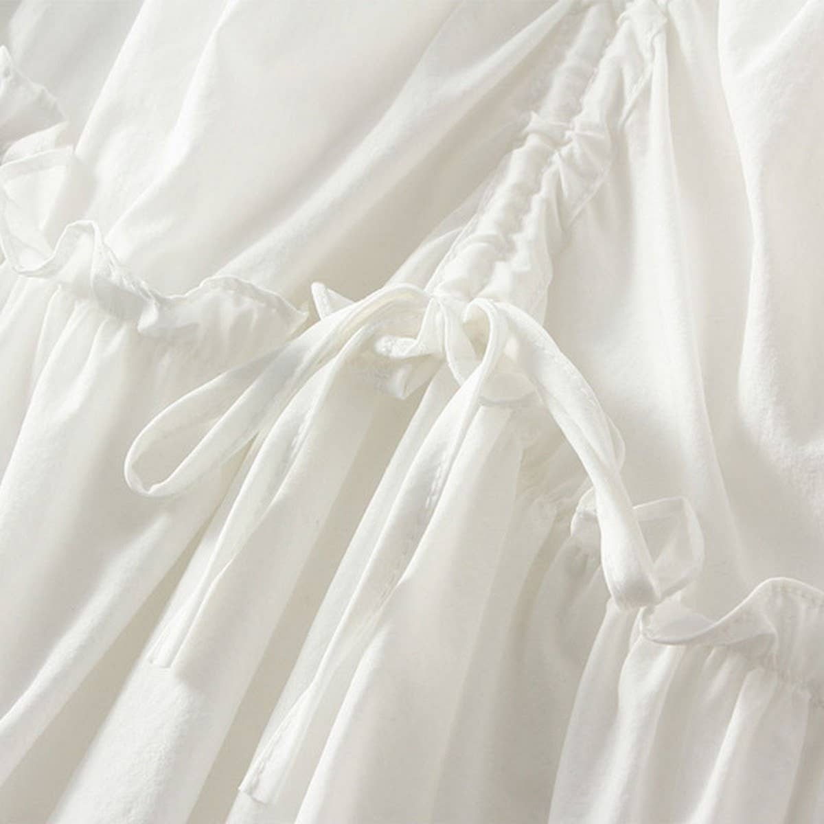 IRREGULAR DRAWSTRING MIDI SKIRT