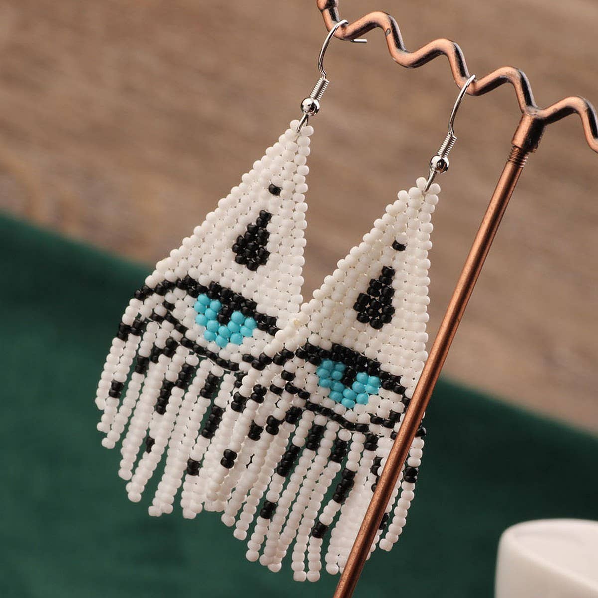 WESTERN DEVIL'S EYE BRAIDED TASSEL EARRINGS