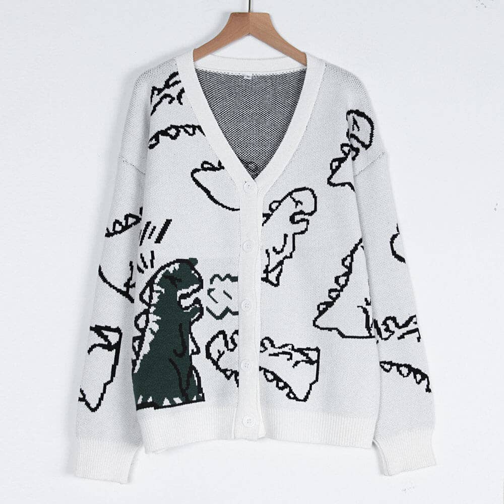 THE JACKET IS A LOOSE CARTOON DINOSAUR CARDIGAN