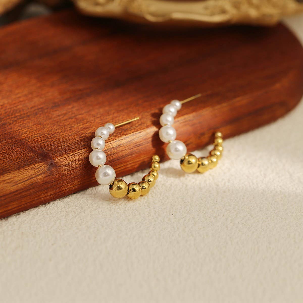 CIRCLE STAINLESS STEEL TWISTED DIAMOND EARRINGS