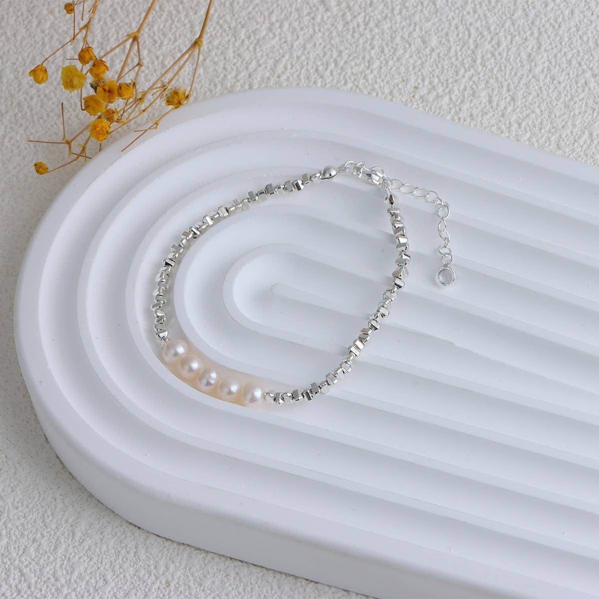 Freshwater pearl bracelet made of broken silver