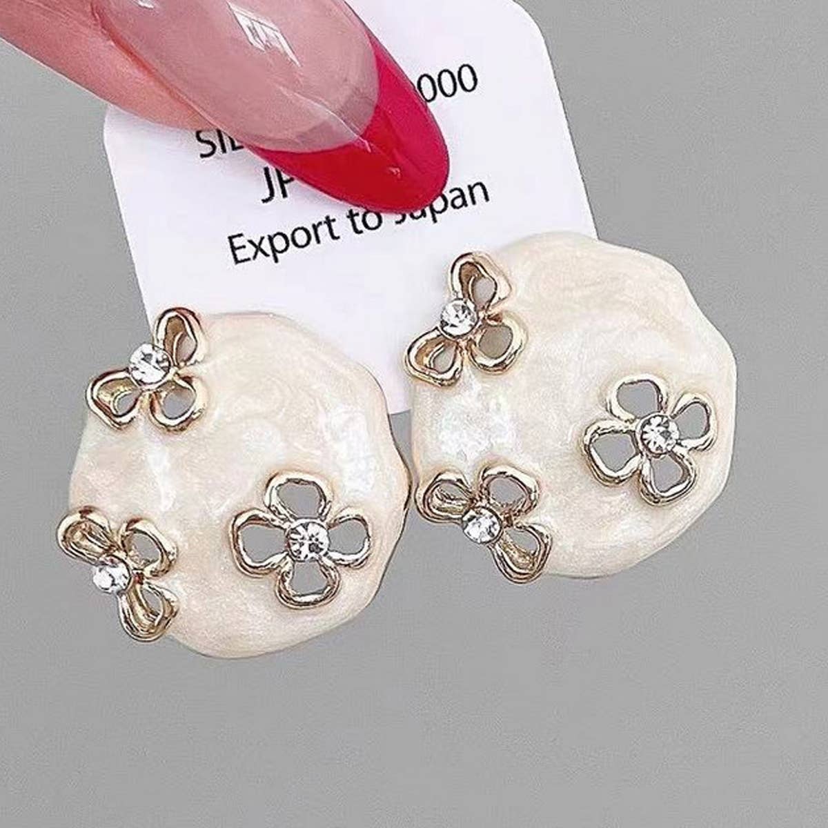 HOLLOW ZIRCON GEOMETRIC FLOWER EARRINGS