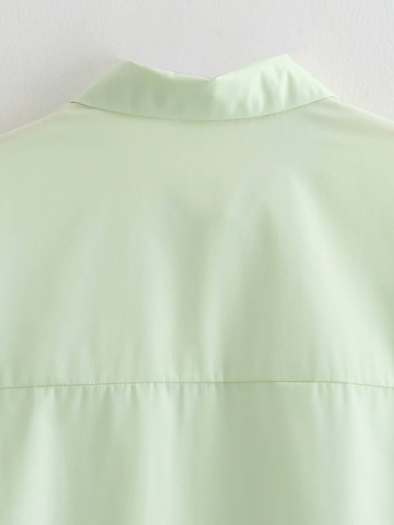 Side-drawstring long-sleeved solid-color shirt