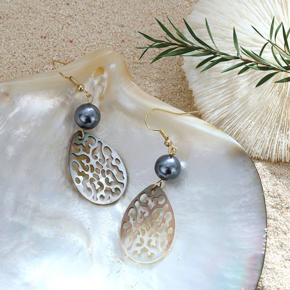 CREATIVE HOLLOW CARVED NATURAL SHELL EARRINGS