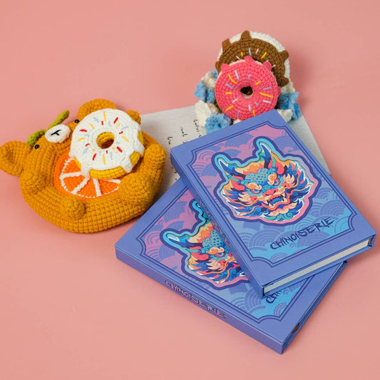 COLORFUL PORTABLE NOTEBOOK ON BLUE BACKGROUND