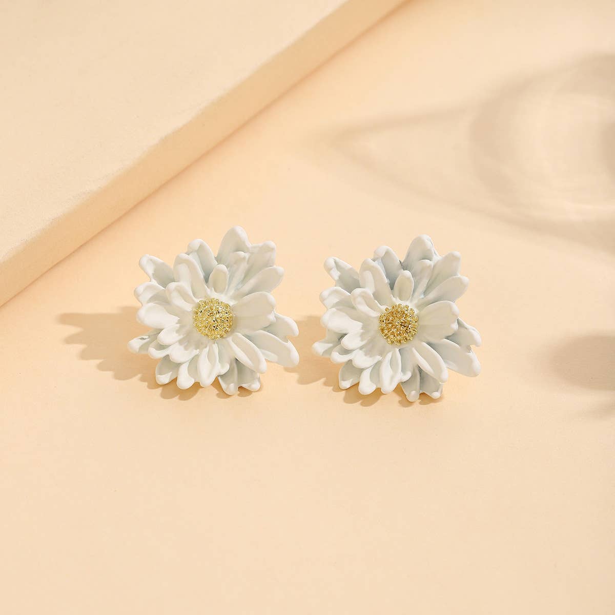 Spray-painted three-dimensional floral earrings