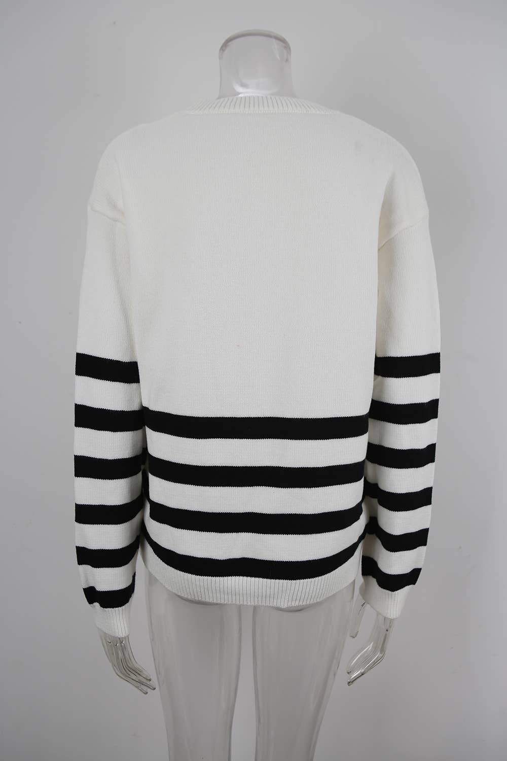 Round-neck, long-sleeved and striped sweater