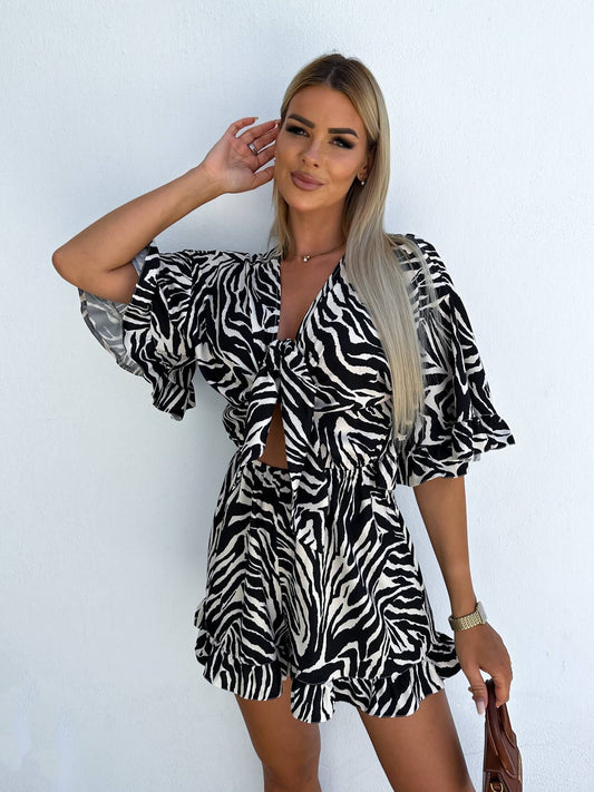 Zebra-print rotator cuff V-neck lace-up rompers