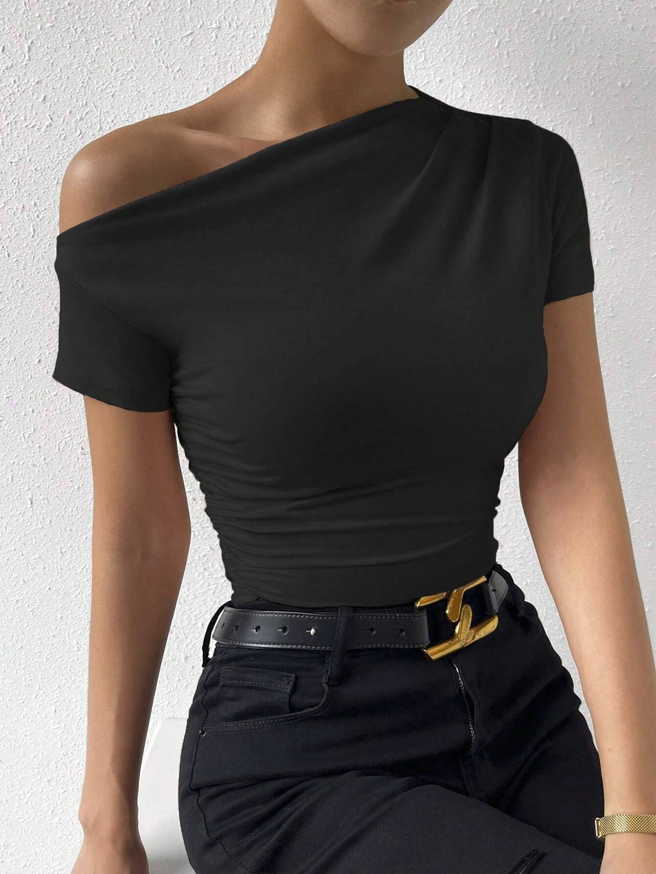 Short-sleeved top with sloping neck design