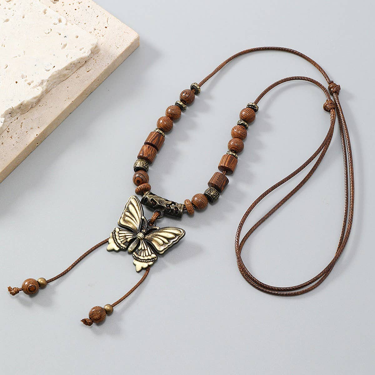 LONG WOODEN BEAD BUTTERFLY TASSEL NECKLACE