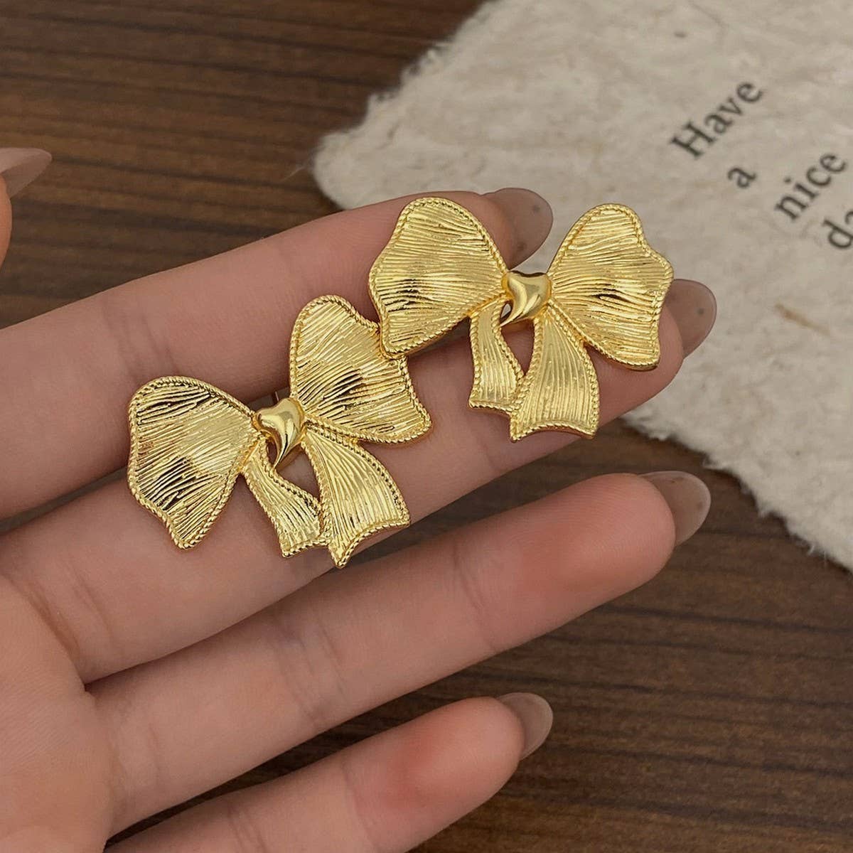 NEW SIMPLE TEMPERAMENT BOW EARRINGS FOR WOMEN