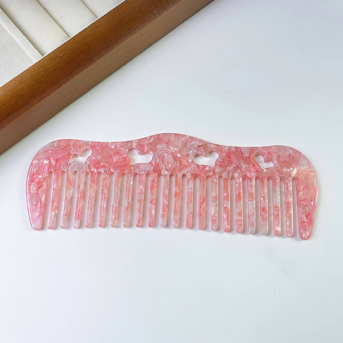 HOLLOW HEART PORTABLE MASSAGE COMB