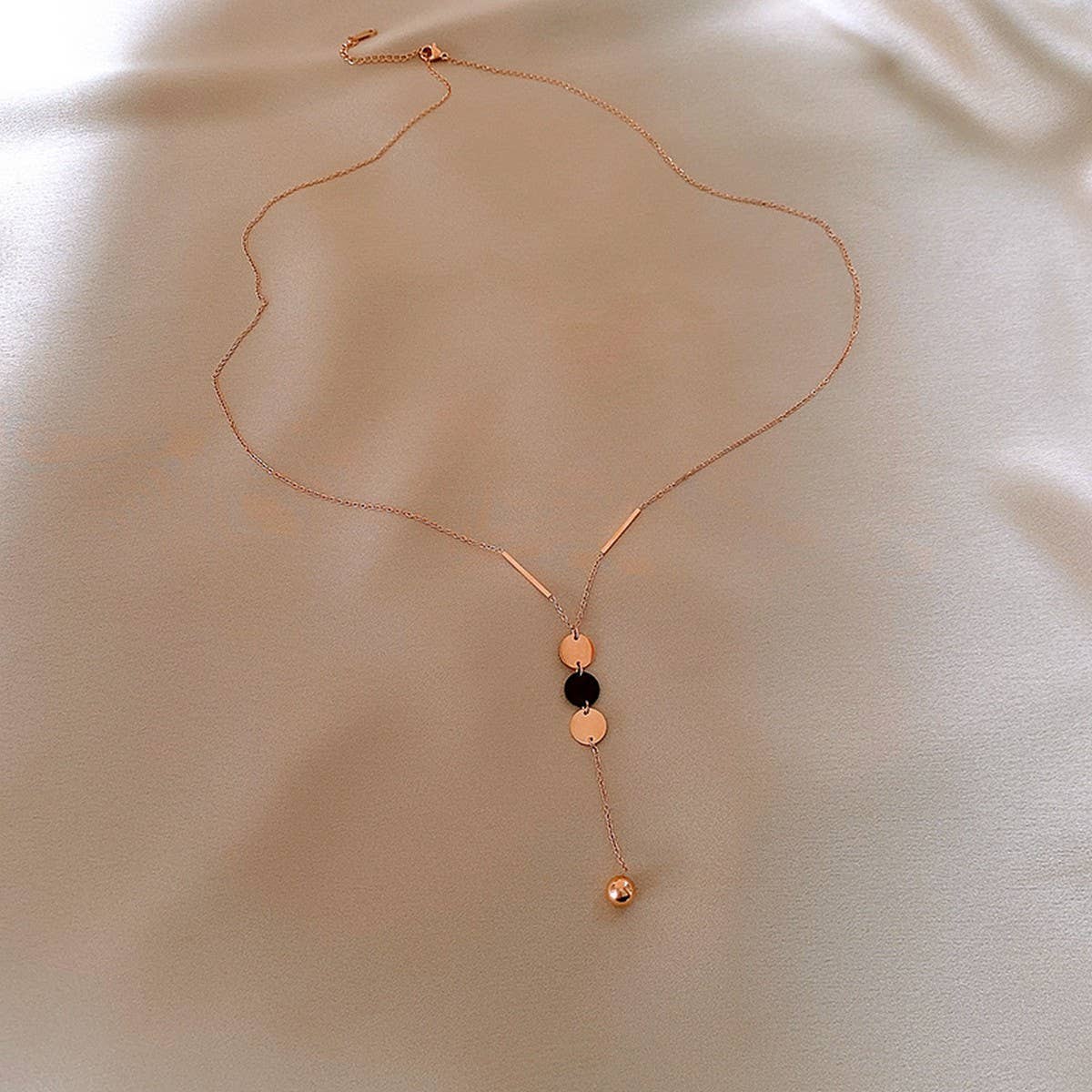 GEOMETRIC SEQUIN TASSEL NECKLACE