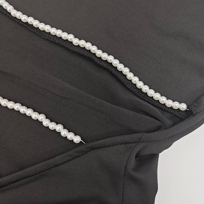 A cinched-neck backless and collared dress