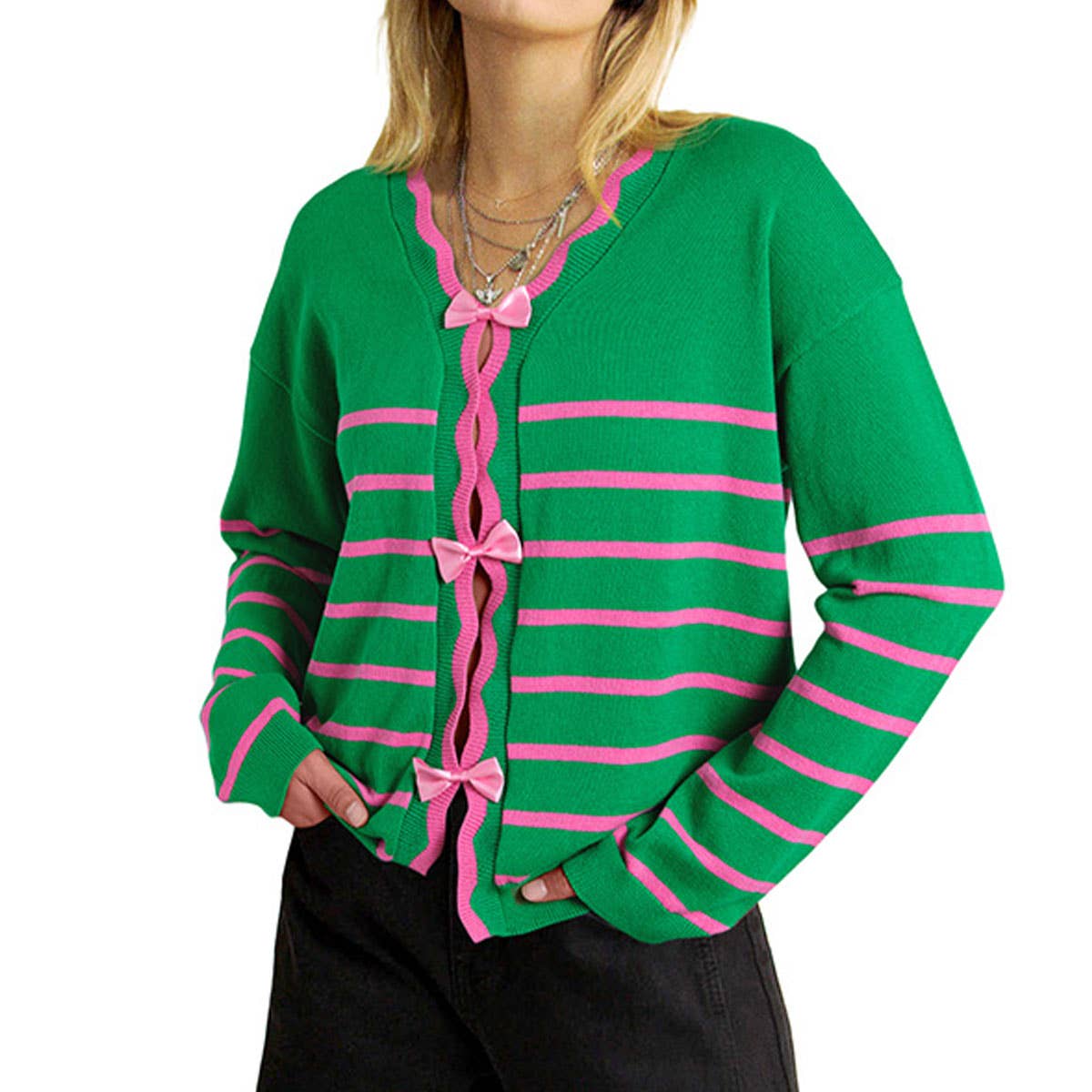STYLISH AND PLAYFUL AGE-REDUCING BOW SWEATER