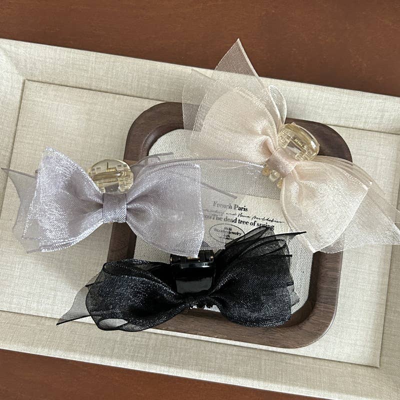 Fashionable and design-oriented mesh bow clipper