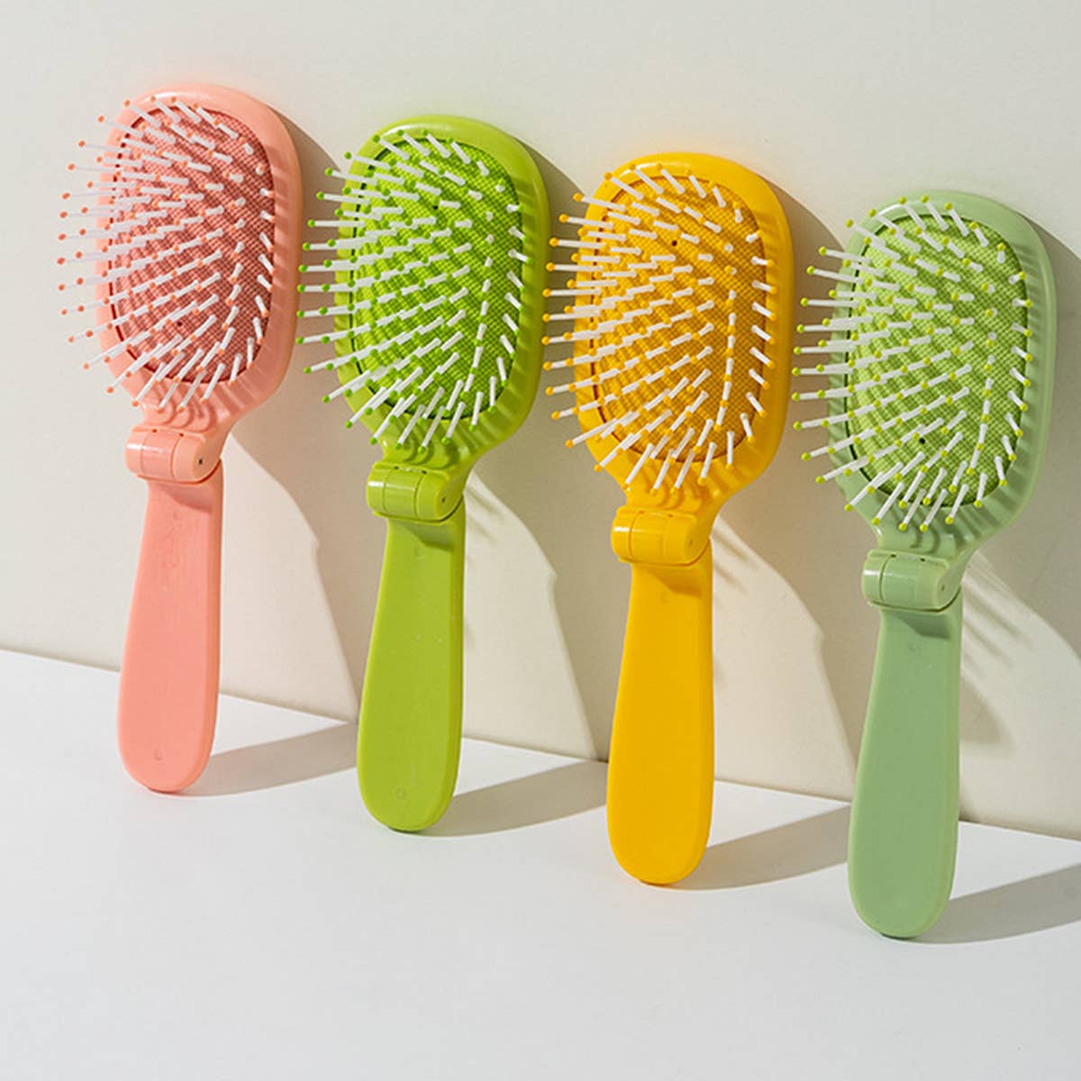 NEW CACTUS FOLDING AIR BAG COMB