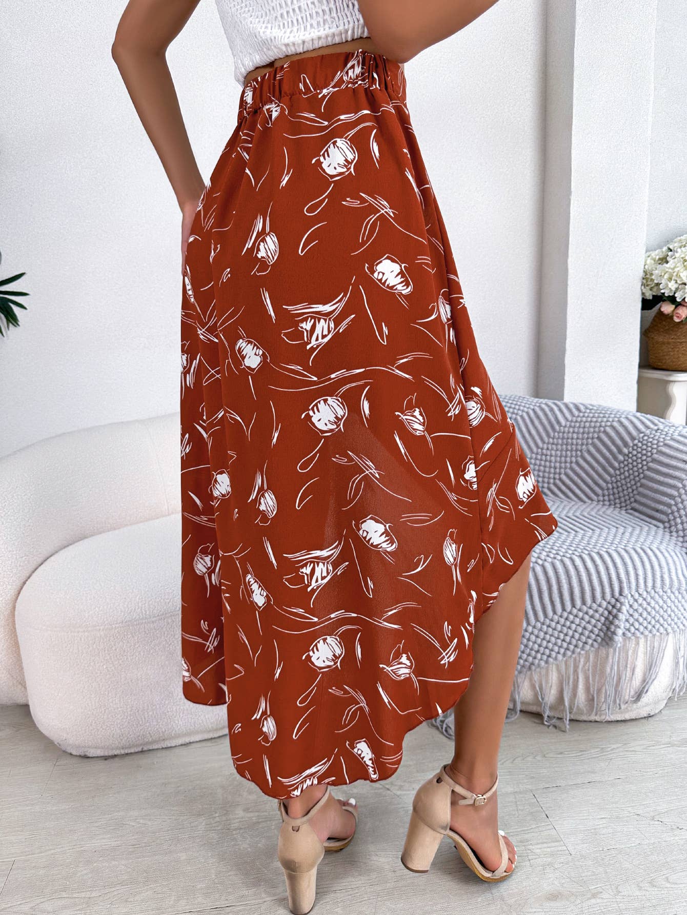 ASYMMETRICAL PEPLUM SKIRT