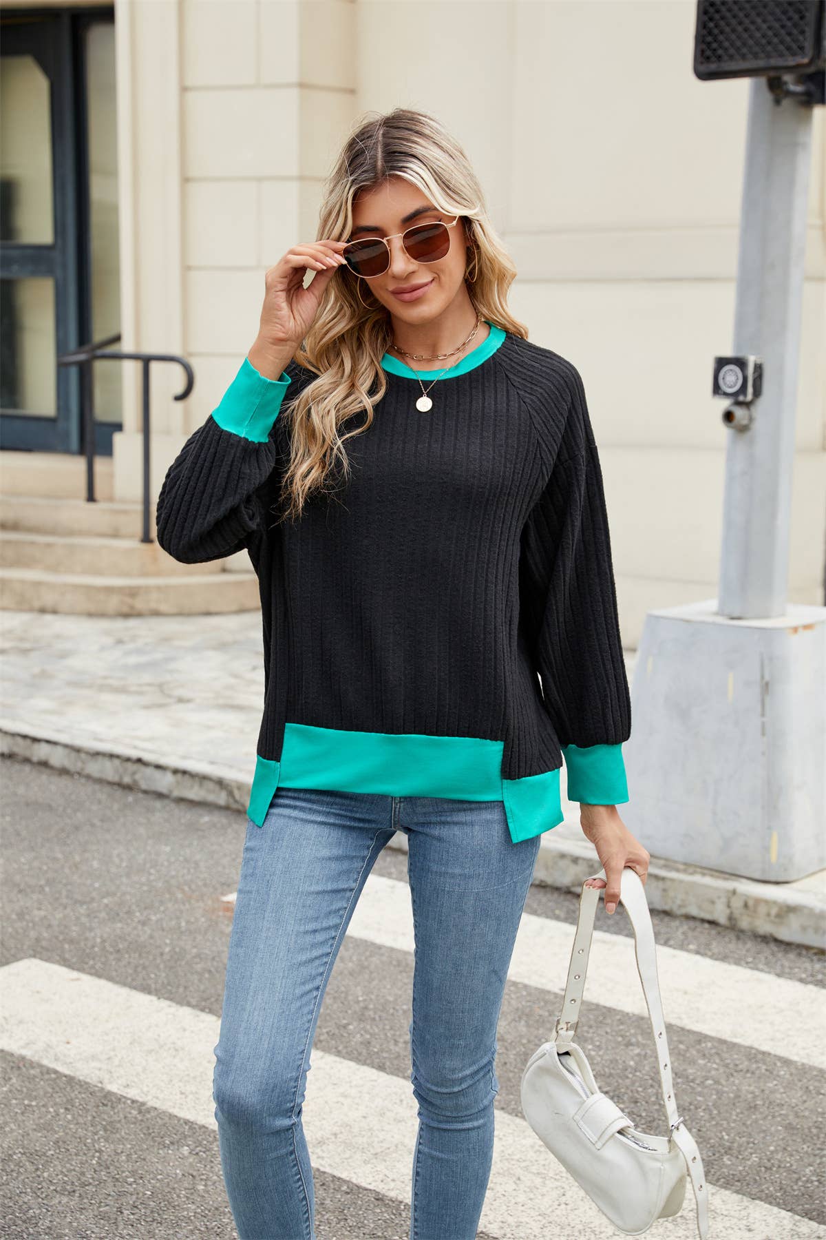 Fashionable color-blocked loose knitted top