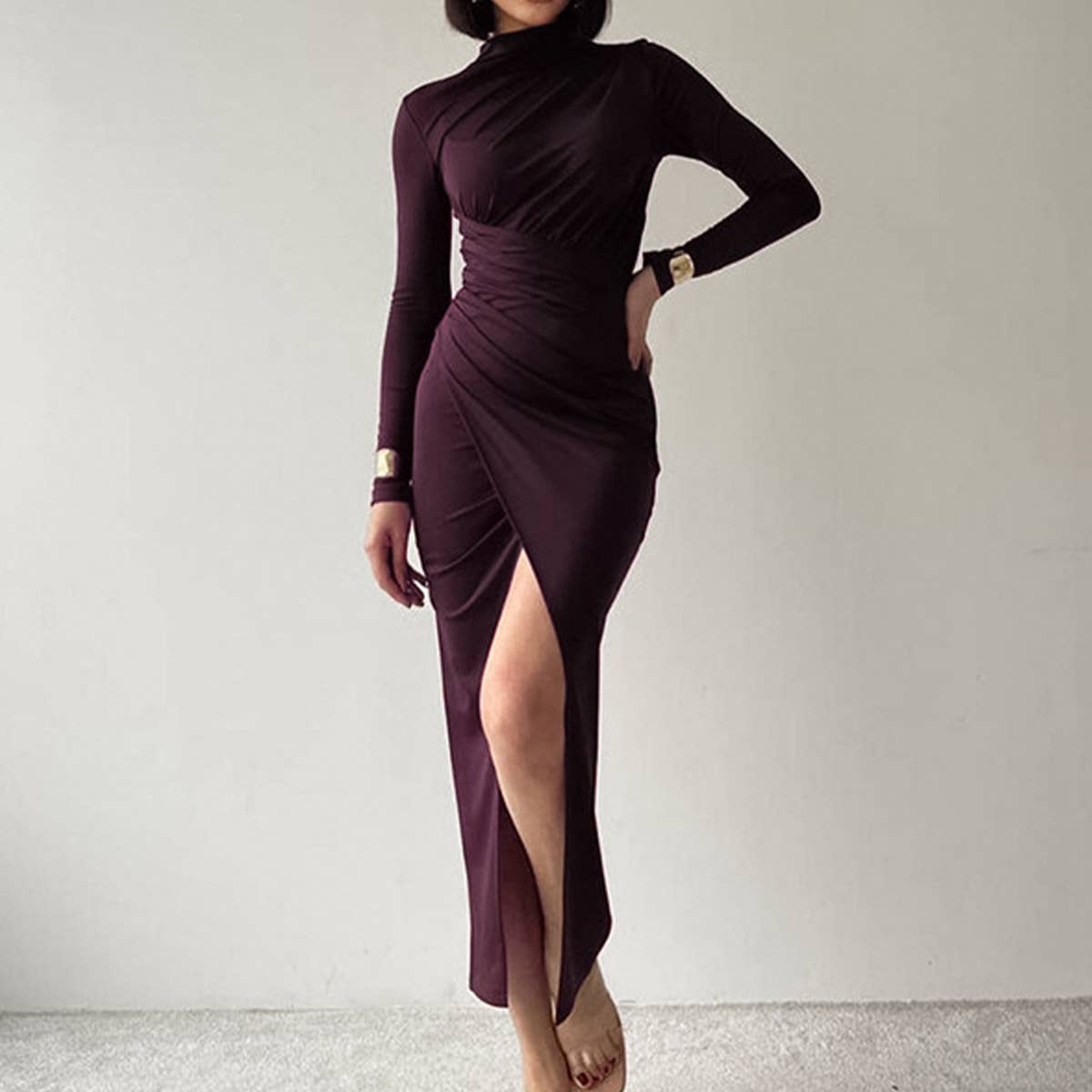 Slim-fit long-sleeved dress with half high neck and slit