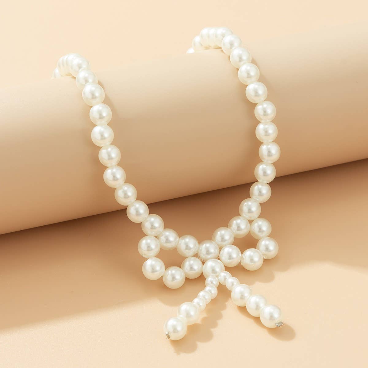 IMITATION PEARL BEADED NECKLACE WITH PEARL BOW