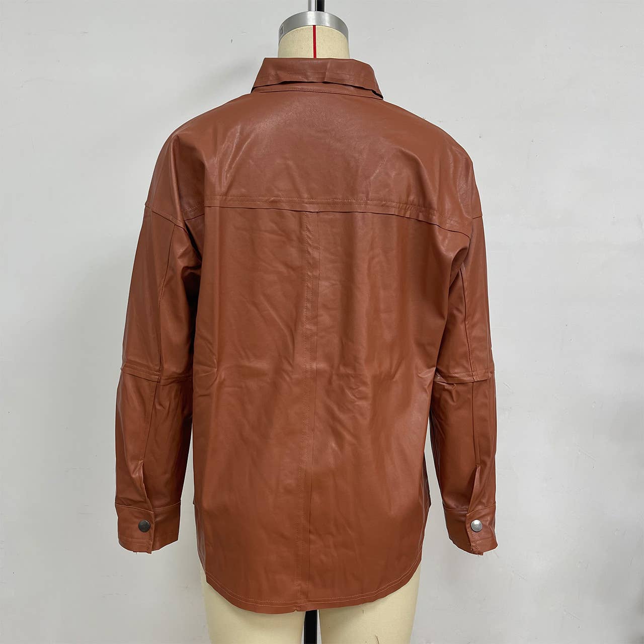 Lapel solid-color long-sleeved leather jacket
