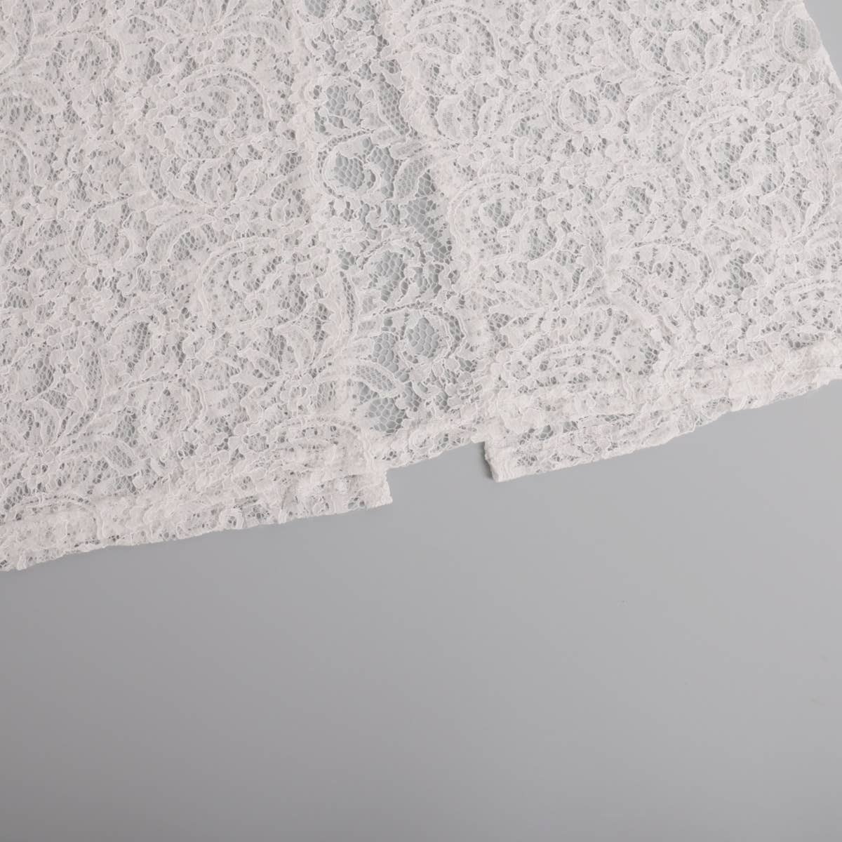 Lace skirt with jacquard cutout slit at the back