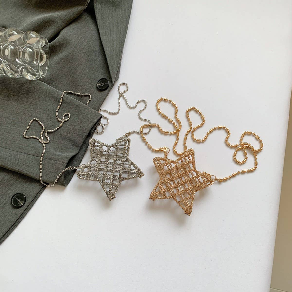 FIVE-POINTED STAR HOLLOW CHAIN SQUARE CLUTCH BAG_CWAB3260