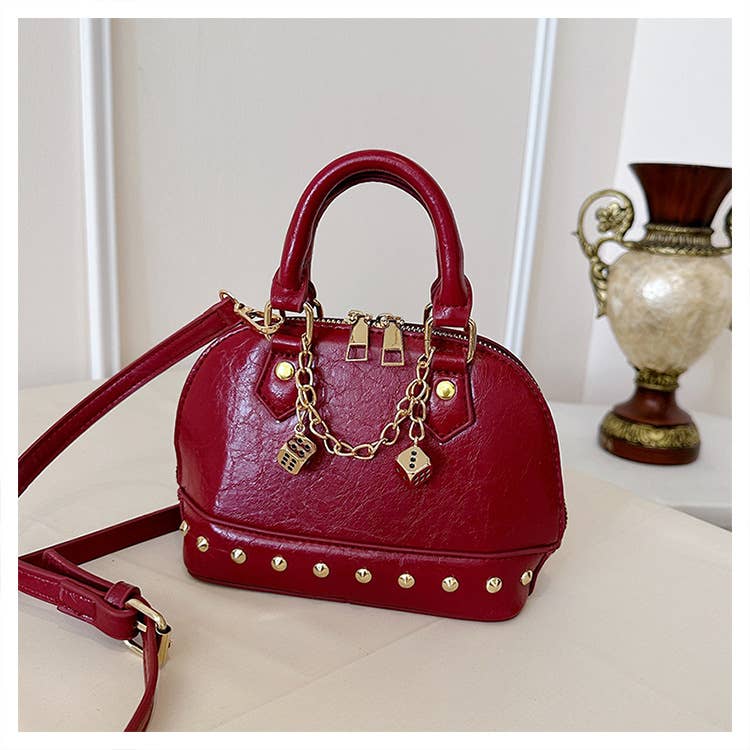 Fashionable riveted single-shoulder bag