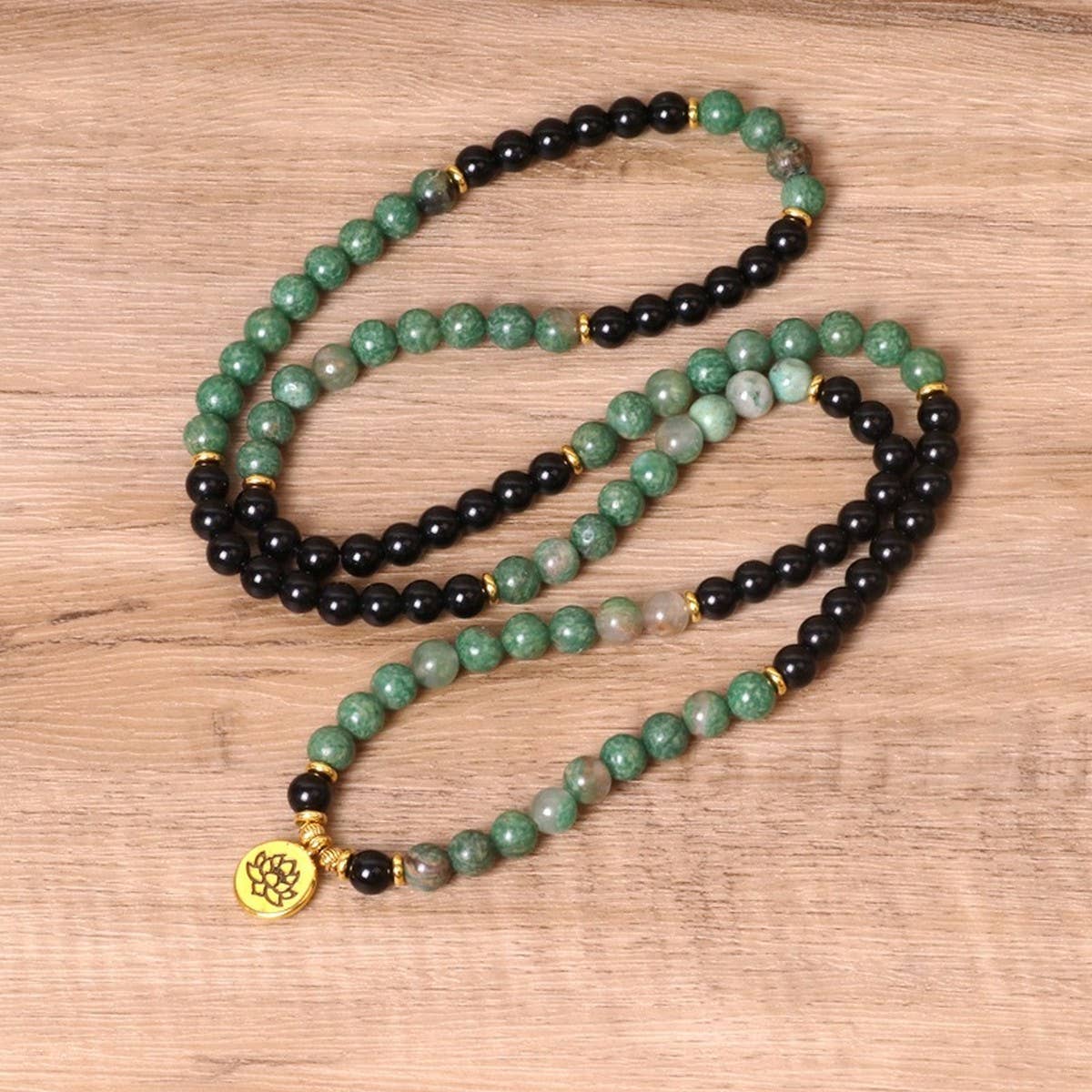 GREEN,BLACK BEADED BRACELETS WITH STRETCHY BANDS