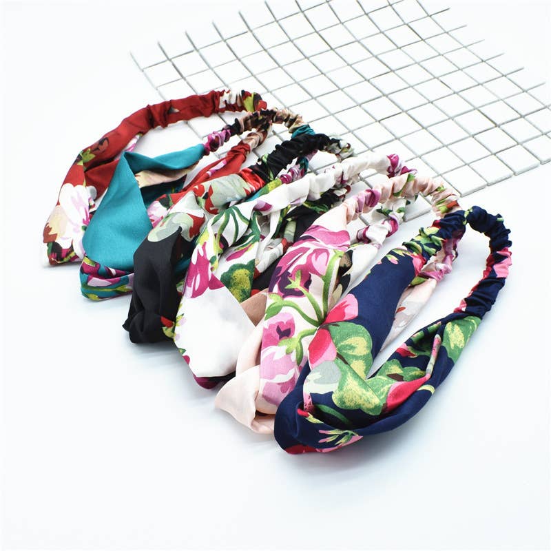 Silk hair band with interlaced patterns
